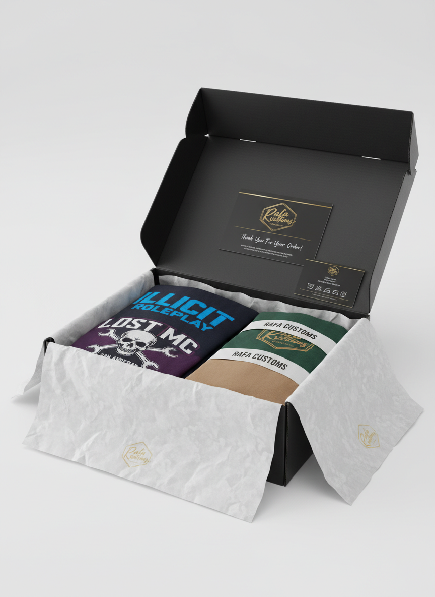 A premium, photographic realism scene of a custom FiveM server clothing collection boxed for delivery, with a sturdy matte-black shipping box partially open on a smooth white studio surface. Inside, tissue-wrapped hoodies and tees are visible, featuring glimpses of bold server logos, clean name tags, and unique faction color schemes. A high-quality Rafa Customs branded thank-you card and a small fabric care guide are carefully placed on top. Soft, even studio lighting from a large front-facing source creates minimal shadows and a polished, e-commerce-ready look. The composition is slightly angled, with the box occupying the center and negative space around it, conveying a professional, luxury unboxing experience tailored for FiveM communities ordering custom apparel for their members.